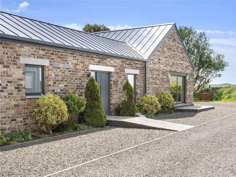 Contemporary stone and zinc house, a current Simpson & Marwick North Berwick listing